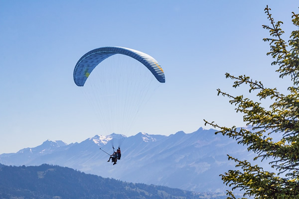 Adventure sports photography. Photograph paragliders in Switzerland.