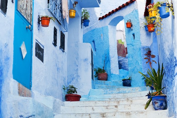 Blue stone street and houses in Morocco.