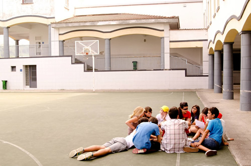 Students learning an English game in their physical education class