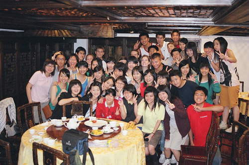 The author's big group of young English students in a restaurant.