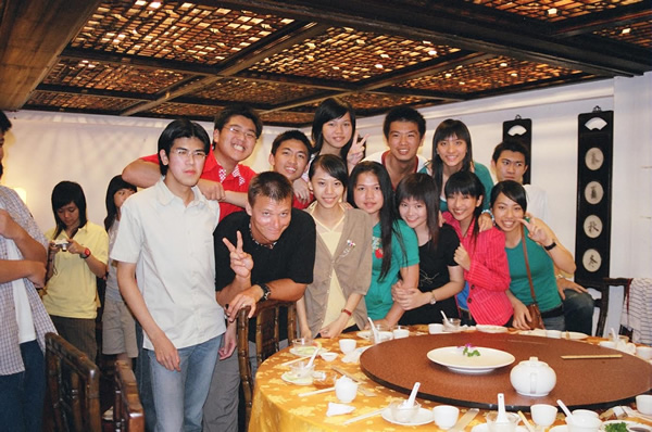 Students in Taiwan at a restaurant with author as English teacher.
