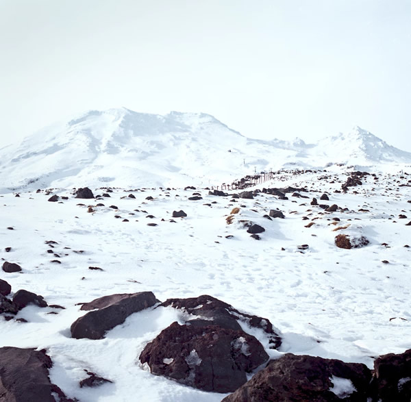 Mount Ruapehu covered with snow seen from a desert road in New Zealand.