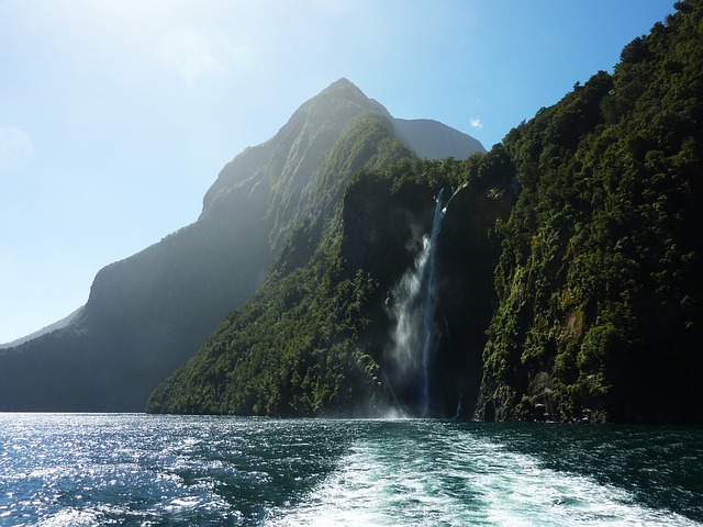 Waterfall with water falling into the ocean on the South Island of New Zealand.