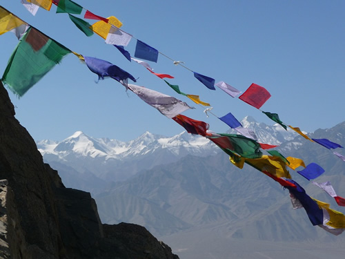 Prayer flags in the wind in Ladakh in the Himalayas, India