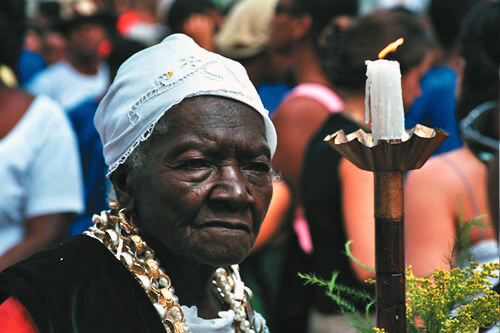 A dignified elder female marches during an annual celebration in Cachoeira, Brazil.