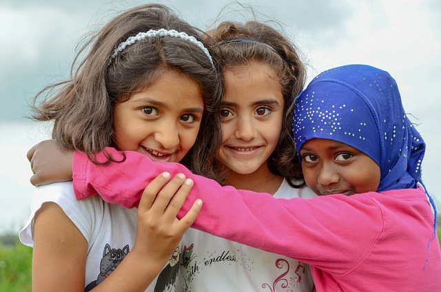 Humanitarian aid work involves helping young girls like these, often refugees.