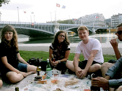 Picnic with friends near Rhone river in Lyon.
