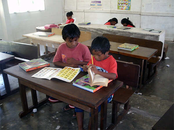 Volunteer to teach English to young children in a classroom in the Marshall Islands.