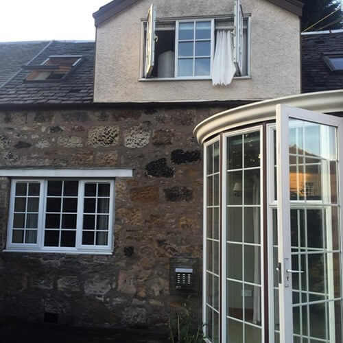 Our coach house and conservatory in Scotland