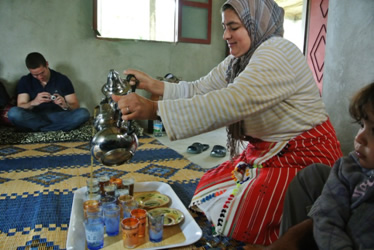 Serving Moroccan tea in village in Morocco