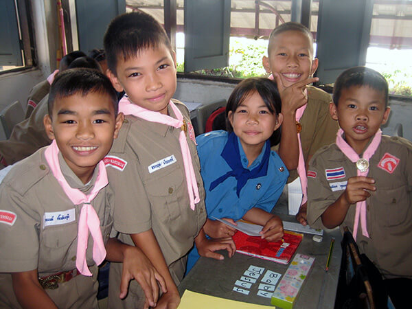 Some of the smiling young students in the classroom in Thailand.