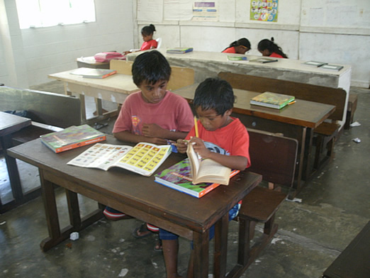 Volunteer teaching English to children in the Marshall Islands