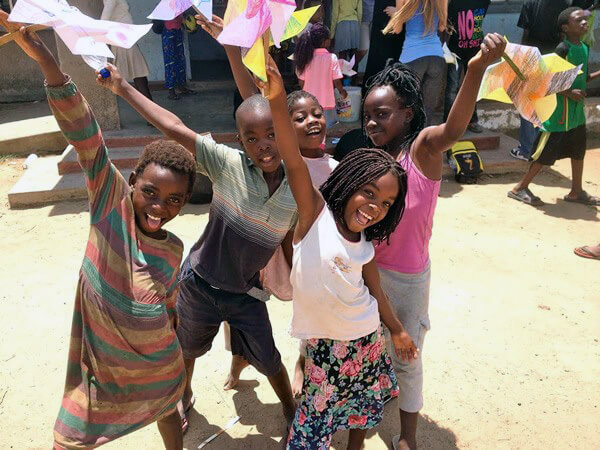 Volunteer service with children in Zambia.